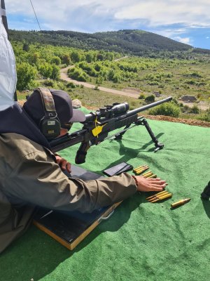 33XC competition rifle at a long-range shooting event